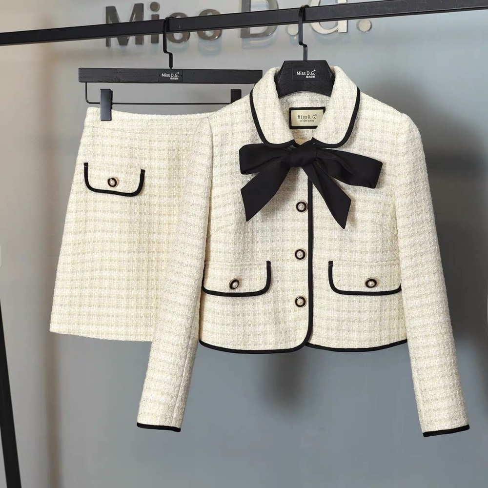 Brand new Tweed mini skirt only.   never worn.